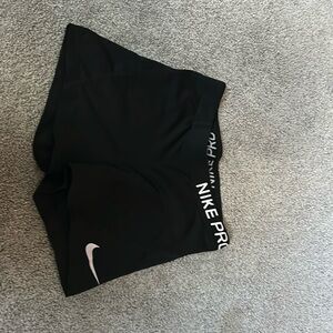 Nike pros black and white size small